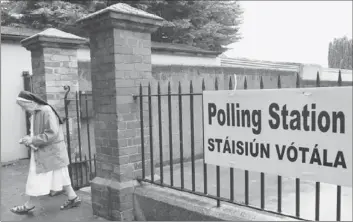  ?? Peter Muhly ?? A NUN LEAVES a polling station in Dublin after voting on the referendum on the European Union fiscal treaty, which calls on countries to limit spending and stick to budgetary targets, among other things.