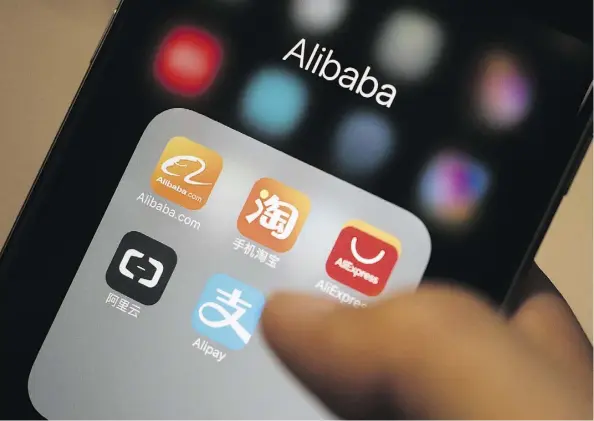  ?? ANTHONY KWAN/BLOOMBERG FILES ?? The Canadian government’s decision to accept Chinese retail juggernaut Alibaba’s Alipay credit reports is part of Canada’s push to court Chinese tourists. The government says it will help it make the travel visa applicatio­n process “more convenient.”