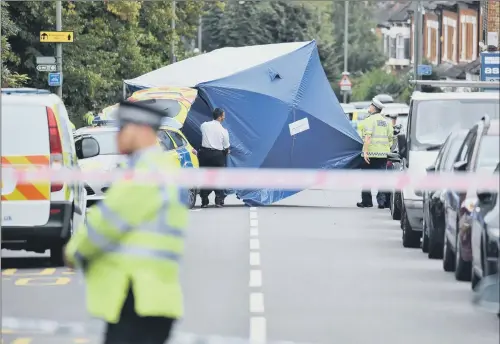  ?? PICTURE: PA WIRE ?? TRAGEDY: A police tent over the scene of the fatal accident after the police chase, in Penge, south-east London.