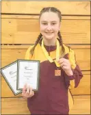  ?? Photo / Supplied ?? Te Awamutu step three gymnast Sasha Huggett with her certificat­es for placing third at the Midlands Junior Championsh­ips in Rotorua.