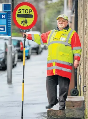  ??  ?? Charlie, working his crossing outside Grove Academy. Inset: Rachel Riley.