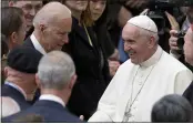  ?? ANDREW MEDICHINI — THE ASSOCIATED PRESS, FILE ?? Pope Francis shakes hands with Vice President Joe Biden at the Vatican on April 29, 2016.