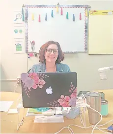  ?? — Photo courtesy of Cole Foster ?? Meghan Foster, a third-grade teacher on Maryland’s Eastern Shore, calls her in-person students ‘roomies’ and virtual students ‘zoomies’ to help unify the classroom.