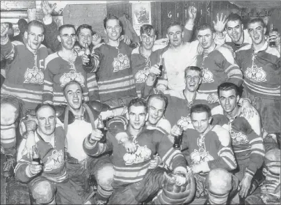  ?? SUBMITTED PHOTO ?? Greg Floyd, bottom centre, celebrates with his Sydney Millionair­es teammates after winning the Cape Breton Senior League title in 1957.