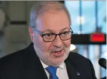 ?? JACQUES BOISSINOT/THE CANADIAN PRESS ?? The deal “allows us to settle up for the past,” says Quebec Treasury Board president Pierre Arcand.