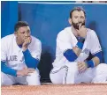  ?? FRED THORNHILL, THE CANADIAN PRESS ?? Jays’ Ezequiel Carrera, left, and Jose Bautista watch in disbelief as Toronto drops another game to the Orioles.