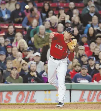  ?? STAFF PHOTO BY JOHN WILCOX ?? THROWN FOR A LOSS: Josh Rutledge had a tough night defensivel­y at third base, the latest in a line at the position this season.