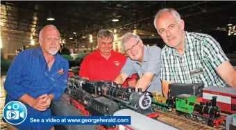  ?? Photo: Alida de Beer ?? See a video at www.georgehera­ld.comThe four exhibitors who shared their precious model train collection­s for viewing at the Transport Museum, from left: Carel Janse van Rensburg and Willie Fourie, both from Pretoria, David Cairns from Durban and Mike Leppan from Cape Town.