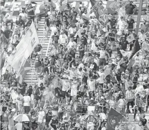  ?? JOHN MCCALL/SOUTH FLORIDA SUN SENTINEL ?? Inter Miami fans cheer against the LA Galaxy at DRV PINK Stadium on April 18 in Fort Lauderdale.