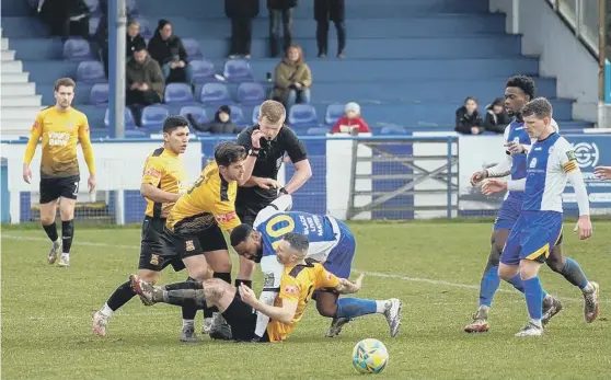  ?? ?? Haywards Heath on the attack against Three Bridges on Saturday - but the game ended in victory for the visitors Picture: Ray Turner