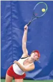  ?? STAFF PHOTO BY ROBIN RUDD ?? Baylor’s Ensley Collins serves while teaming with Sloane Proffitt in a doubles match against Knoxville Catholic in the Division II-AA girls’ team final Wednesday.