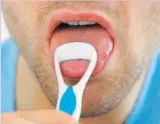  ?? PHOTO: ISTOCK ?? Scraping is an efficient way to remove bacteria from your tongue