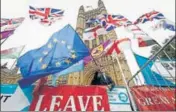  ?? REUTERS FILE ?? An anti-Brexit protester waves an EU flag.