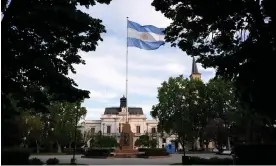  ?? ?? An Argentinia­n flag flutters in the wind at 25 de Mayo square in the town of Saladillo, Buenos Aires province, Argentina, on 9 November 2023. Photograph: Luis Robayo/AFP/Getty Images