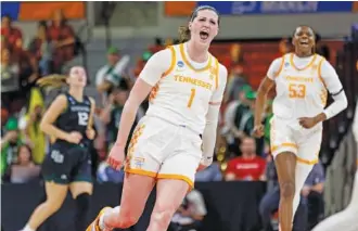  ?? AP PHOTO/BEN MCKEOWN ?? Tennessee’s Sara Puckett (1) celebrates during an NCAA tournament first-round game against Green Bay on Saturday in Raleigh, N.C.. Puckett scored 14 points in the sixth-seeded Lady Vols’ 92-63 win.