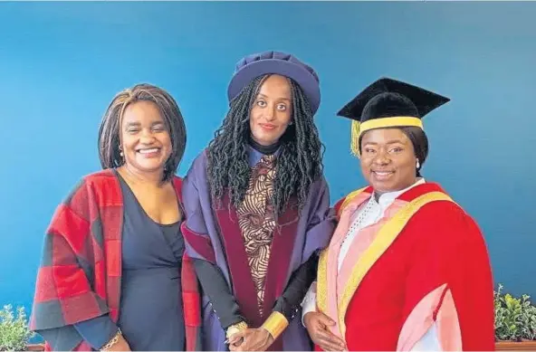  ?? ?? ACHIEVEMEN­T: From left: Debora Kayembe, Leyla Hussein and Martina Chukwuma-Ezike during Dr Hussein’s installati­on at St Andrews University.