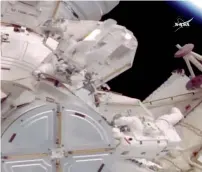  ?? AP ?? Astronauts Jack Fischer and Peggy Whitson on a spacewalk outside the Internatio­nal Space Station on Friday. —