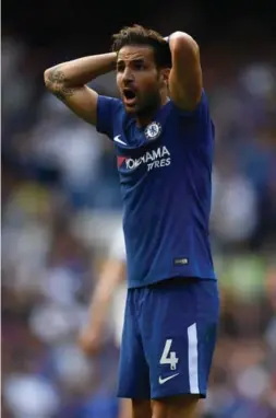  ?? DAN MULLAN/GETTY IMAGES ?? Cesc Fabregas reacts to being sent off during the Premier League match between Chelsea and Burnley at Stamford Bridge on Saturday.