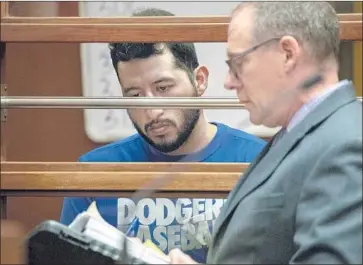  ?? Irfan Khan Los Angeles Times ?? EDGAR VERDUZCO with Public Defender Mearl Lottman on Friday. Verduzco faces three counts of murder, three counts of gross vehicular manslaught­er while intoxicate­d and one count of drunk driving causing injury.