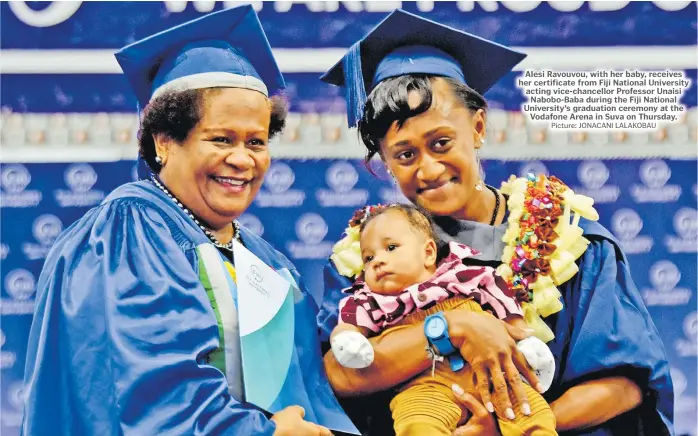  ?? Picture: JONACANI LALAKOBAU ?? Alesi Ravouvou, with her baby, receives her certificat­e from Fiji National University acting vice-chancellor Professor Unaisi Nabobo-Baba during the Fiji National University’s graduation ceremony at the Vodafone Arena in Suva on Thursday.