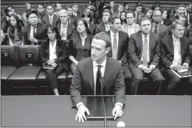  ?? AP Photo/Andrew Harnik ?? Facebook : Facebook CEO Mark Zuckerberg arrives to testify before a House Energy and Commerce hearing on Capitol Hill in Washington, Wednesday about the use of Facebook data to target American voters in the 2016 election and data privacy.
