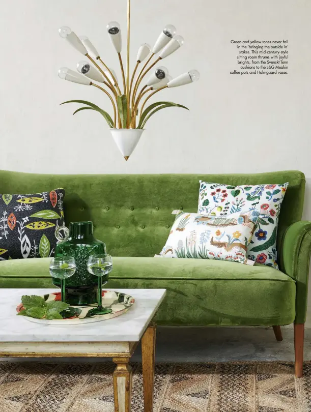  ??  ?? Green and yellow tones never fail in the ‘bringing the outside in’ stakes. This mid-century-style sitting room thrums with joyful brights, from the Svenskt Tenn cushions to the J&G Meakin coffee pots and Holmgaard vases.