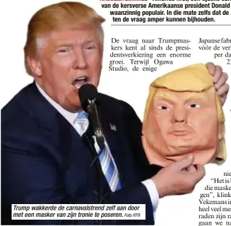  ?? Foto RTR ?? Trump wakkerde de carnavalst­rend zelf aan door met een masker van zijn tronie te poseren.