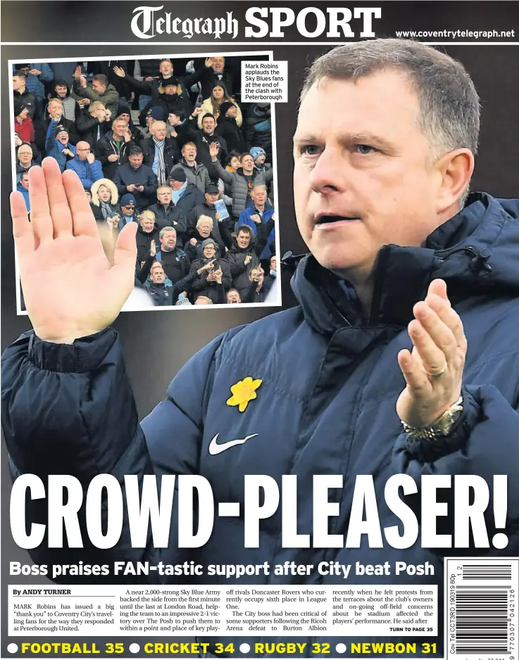  ??  ?? Mark Robins applauds the Sky Blues fans at the end of the clash with Peterborou­gh