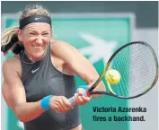  ??  ?? Victoria Azarenka fires a backhand.