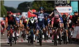  ?? ?? Alberto Dainese celebrates winning stage 19. Photograph: Óscar del Pozo/AFP/Getty