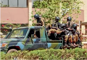  ?? AP ?? Burkina Faso troops thwarted an attempt by al Qaeda- and Isis-affiliated fighters in March 2018 to isolate the capital, Ouagadougo­u, by seizing control of surroundin­g highways.