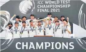  ?? Photo / Ian Walton ?? New Zealand are crowned Test champions after beating India.