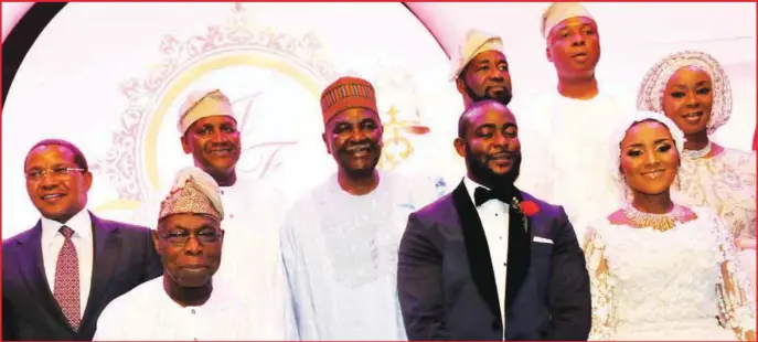  ??  ?? WHEN HEAVYWEIGH­TS DINE… L–R: Former President of Tanzania, Dr. Jakaya Kikwete; former President Olusegun Obasanjo; bride's father, Alhaji Aliko Dangote; former Head of State, Yakubu Gowon; groom's father, Muhammed Abubakar; Senate President Bukola...