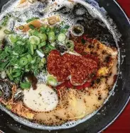  ??  ?? Japanese-style pub Toukei serves Spicy Black ramen.