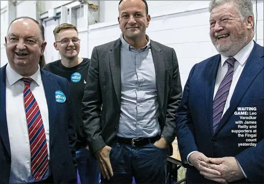  ??  ?? WAITING GAME: Leo Varadkar with James Reilly and supporters at the Fingal count yesterday