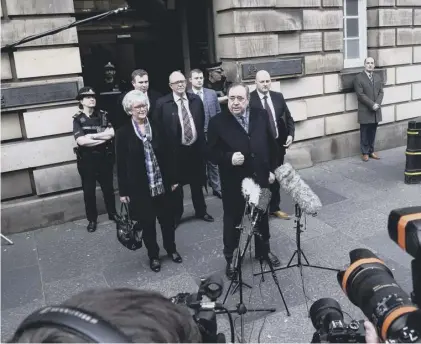  ??  ?? 0 Alex Salmond faces the media after being cleared of charges of sexual assaut in March 2020