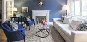  ??  ?? Painting a room or just a wall in a deep colour like this gorgeous navy (Farrow and Ball’s Stiffkey Blue), is a great way to cosy up a room, designer Emma Doucet says.