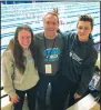  ?? SUBMITTED PHOTO ?? Medicine Hat Waves Anna Nozewski (left) and Aaron Kruger (right) pose with coach Tom Mortlock at the Western Canadian Championsh­ips in Victoria this past weekend.