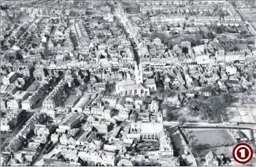  ??  ?? An aerial view of Ashford in 1929 showing s some familiar features such as St Mary’s Church, centre, and the former Congregati­onal Church at the corner of Church Road and Tufton Street, bottom. The town then was largely under-developed and untouched in...
