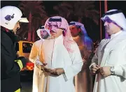  ?? BAHRAIN NEWS AGENCY ?? Bahrain Interior Minister Sheikh Rashid bin Abdullah Al Khalifa, centre, said Saturday night’s pipeline blast was a terrorist act directed by Iran.