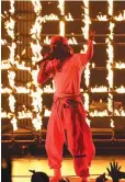  ??  ?? KENDRICK LAMAR performs onstage during the 2017 MTV Video Music Awards.