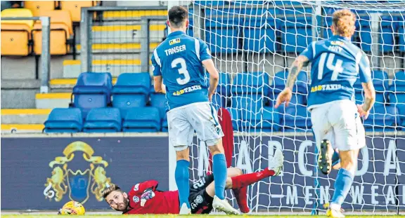  ?? Picture: SNS. ?? St Johnstone’s Scott Tanser sees his penalty saved by Motherwell’s Mark Gillespie at McDiarmid Park last month.