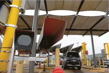  ?? Photos by Billy Calzada / Staff photograph­er ?? This shaded camera is part of the system testing facial recognitio­n biometric technology on the border. Privacy advocates object to the cameras, saying exit checks were never meant to put identities of U.S. citizens into a vast database.