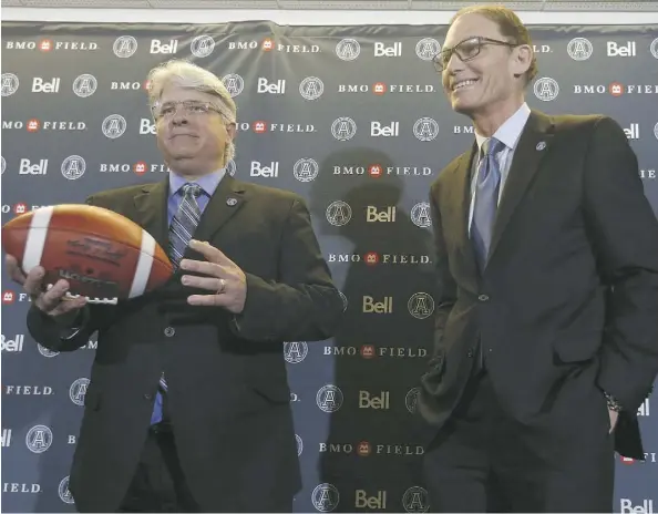  ?? JACK BOLAND/FILES ?? Jim Popp, left, and Marc Trestman meet with the press in Toronto on Feb. 28. The general manager and head coach joined the Toronto Argonauts well into the CFL’s most recent off-season, but they found a way to win the East Division and get the team...