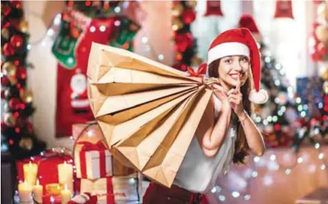  ?? |DREAMSTIME ?? Utiliza parte de tu aguinaldo para liquidar tus deudas, así destinarás lo justo para los regalos de Navidad.