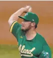  ?? Ashley Landis / Associated Press ?? A’s reliever J.B. Wendelken posted a 1.80 ERA in 25 innings in the short season.