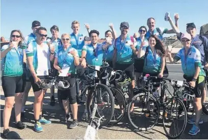  ??  ?? ●●Staff from Hopwood Hall College who took on a Manchester to Blackpool sponsored bike ride