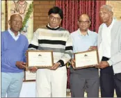  ??  ?? Brothers Dr Hemant Vallabh and Dr Dilip Vallabh received awards for their many years of service through the Satya Sai organisati­on with underprivi­leged communitie­s across Gauteng. They are flanked by Sabay elders Virgil Padayachie and Vythi Pillay.