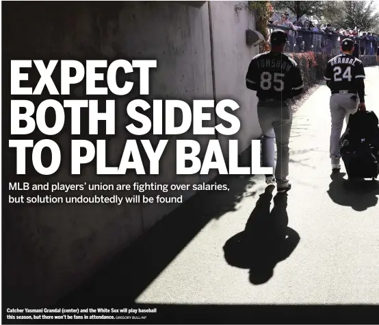  ?? GREGORY BULL/AP ?? Catcher Yasmani Grandal (center) and the White Sox will play baseball this season, but there won’t be fans in attendance.