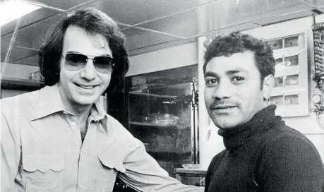  ?? PHOTO: AUCKLAND STAR HISTORIC COLLECTION ?? The 1970s saw the Dawn Raids and the stigmatisi­ng of Polynesian­s, including Tony Peni Latu, right, who could not afford his air fare home to pick up official entry papers. American singer Neil Diamond read of his situation and provided the money for the fare.